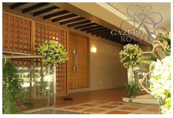 Wooden doors separate the balcony and the bridal suite